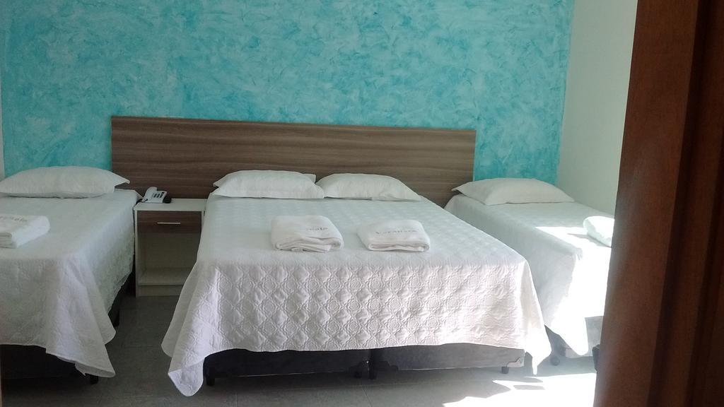 Pousada Veraneio Enseada Гуаружа Екстериор снимка